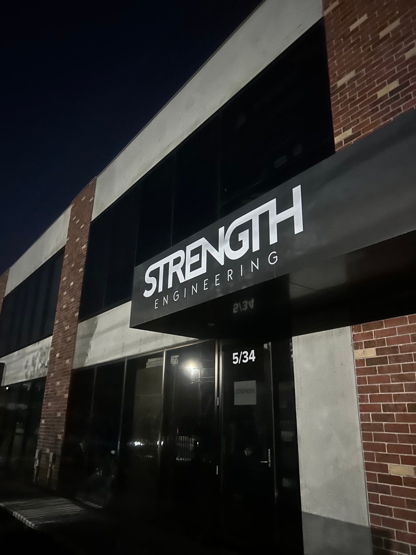 Strength Engineering illuminated signage